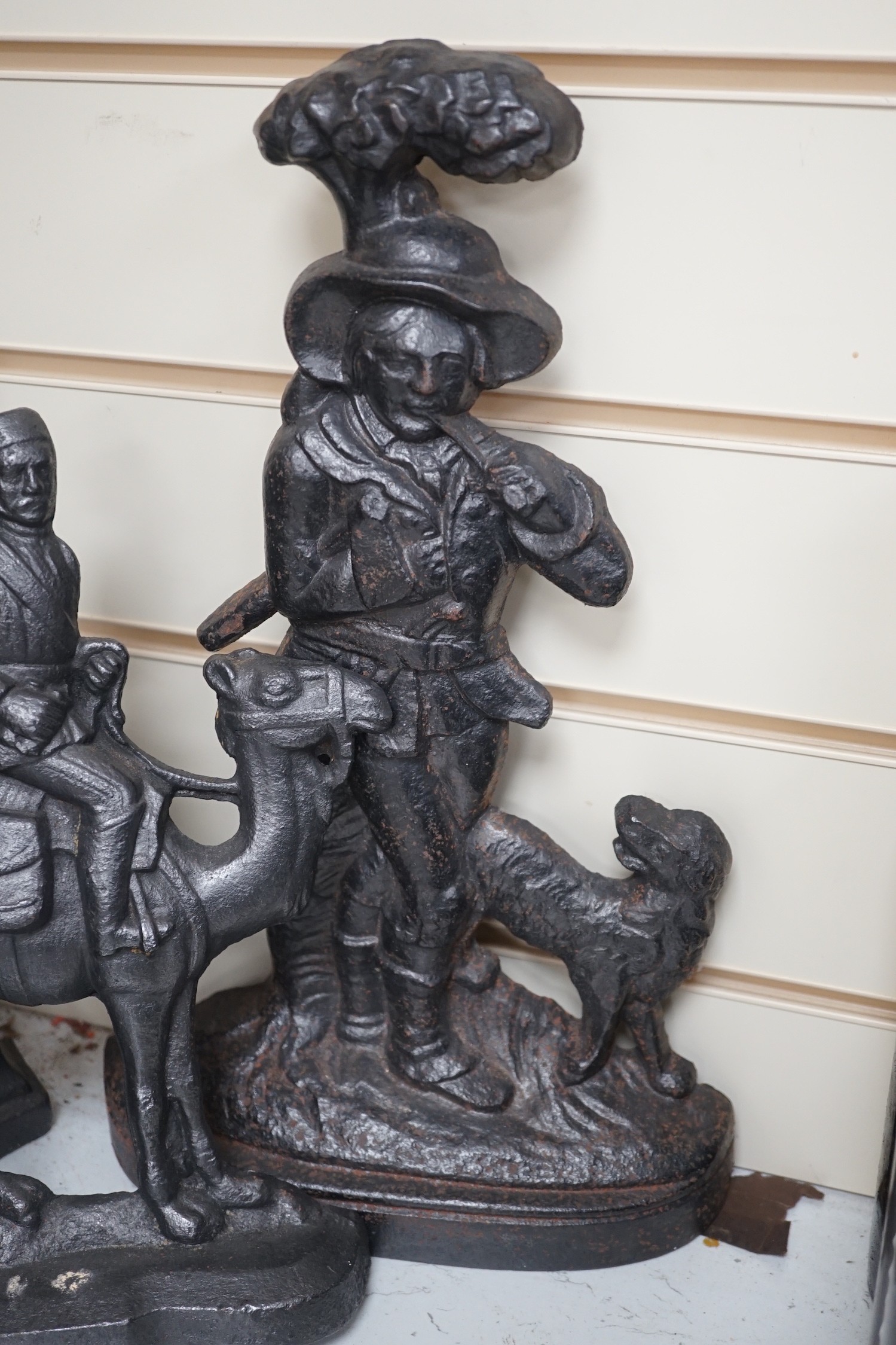 Three Victorian cast iron figural doorstops, 40cm